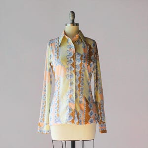 1970s Mr. Dino Blouse / 70s Colorful Polyester Knit Novelty Print Top with Castles and Flowers from Mr. Dino