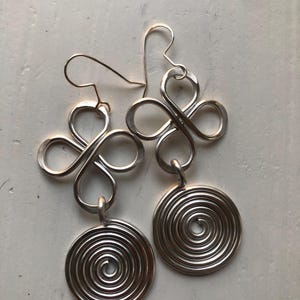 wire wrapped hammered silver metal earrings