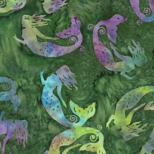 May include: A green fabric with a repeating pattern of mermaids in shades of blue, purple, and green. The mermaids are stylized and have flowing hair and tails.