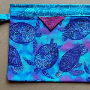 Bolsa con cierre a presión con diseño de tortugas marinas azules