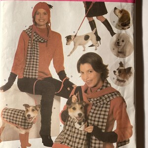 May include: Simplicity sewing pattern number 4749 for making a hat, scarf, and vest for a dog. The pattern includes instructions for making a plaid scarf and vest for a dog, as well as a hat for the owner. The pattern is for all sizes.