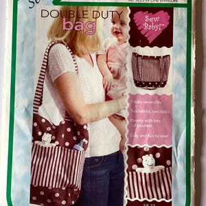 May include: SewBaby! pattern F868 for a double duty bag. The pattern includes instructions for a reversible bag with two fabrics, two looks, lots of pockets, and is easy and fun to sew. The bag is shown in brown and pink with white polka dots and white stripes.
