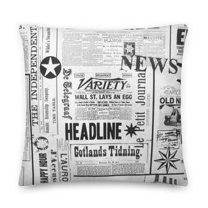 May include: Black and white newspaper print pattern with headlines like "The Independent", "De Telegraaf", "Variety", "Le Petit Journal", "Gotlands Tidning", and "Headline".