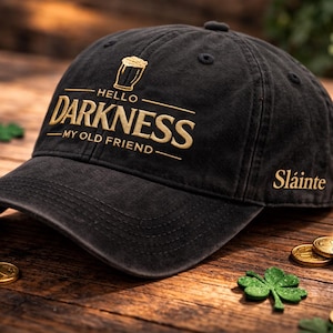 May include: A set of three ceramic mugs with a speckled, matte finish. The mugs are in shades of cream, light gray, and dark gray. Each mug has a simple, minimalist design, perfect for coffee or tea.