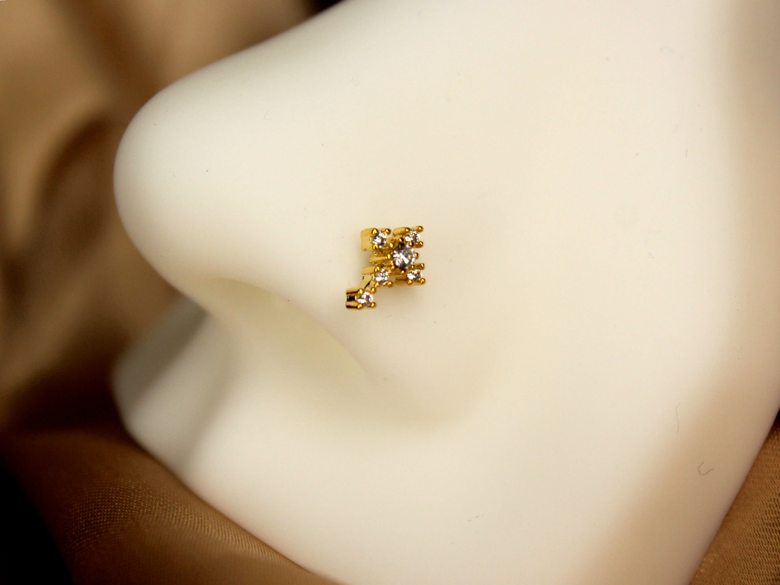 Gold cross nose ring deals
