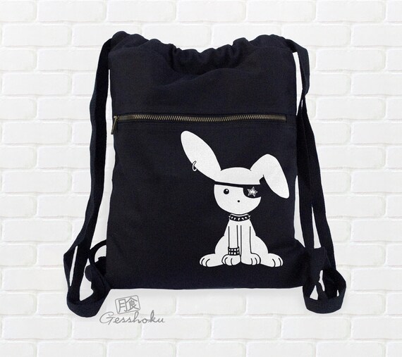 white rabbit backpack