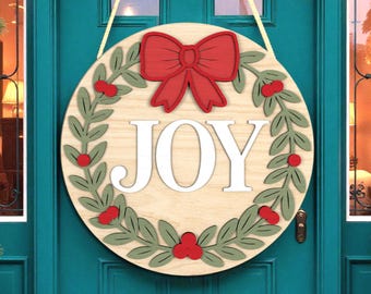 Türschild Weihnachten | JOY Rundes Holzschild mit roter Schleife und Kranz | Urlaub Haustür Dekor | Rustikales Bauernhaus Weihnachtsschild