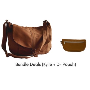 May include: A brown canvas shoulder bag with a flap closure and adjustable strap, paired with a matching brown pouch with a zipper. The text "Bundle Deals (Kylie + D- Pouch)" is displayed below the bags.