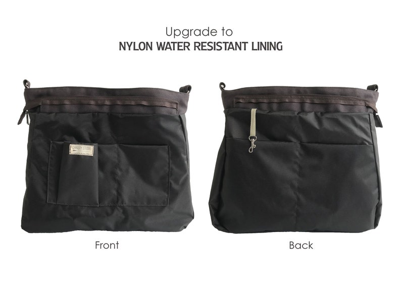 May include: Black tote bag with nylon water-resistant lining. The front of the bag has a rectangular pocket and a small square pocket with a metal label. The back of the bag has a rectangular pocket and a strap with a metal clasp.