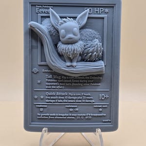 Carte Pokémon Évoli 3D - objet de collection indispensable pour les fans - excellent cadeau
