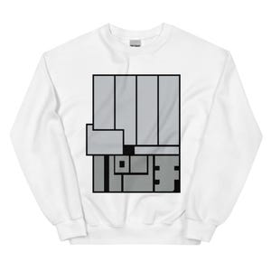 Könnte beinhalten: Weißes Sweatshirt mit einem grauen geometrischen Design. Das Design zeigt eine rechteckige Form mit vertikalen Linien und anderen geometrischen Formen. Das Sweatshirt ist aus einem weichen Material und hat einen Rundhalsausschnitt.