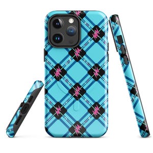 May include: A blue phone case with a black and pink tartan pattern. The case has a built-in ring holder.