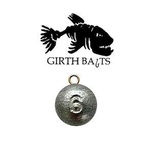 May include: A silver round fishing sinker with a gold loop at the top. The sinker has a number "6" embossed on the side. The sinker is a product from Girth Baits.