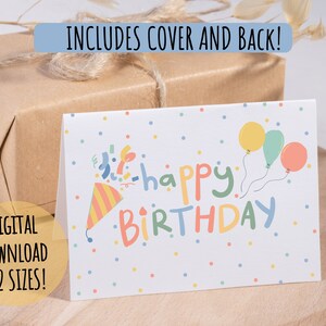 Tarjeta de feliz cumpleaños para fiesta infantil, niño y niña, género neutro, arcoíris en tonos tierra apagados, frente y reverso horizontal, descarga digital imprimible