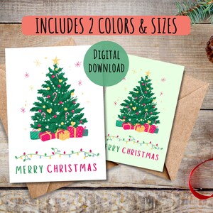May include: Two Christmas cards with illustrated Christmas trees, gifts, and string lights. One card is white, the other is light green. Text on the cards reads "MERRY CHRISTMAS". The cards are on brown envelopes, with text that says "INCLUDES 2 COLORS & SIZES" and "DIGITAL DOWNLOAD".