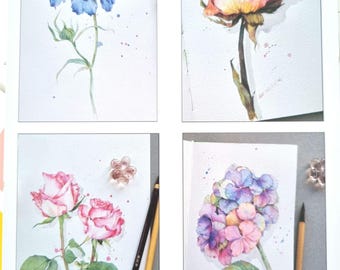 Watercolour kit of flowers ready to paint or colour in. Pack consisting of 4 A4 designs, 2 free pigment palettes and a brush.