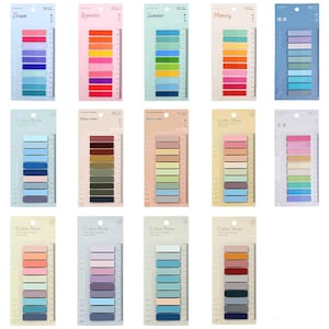 May include: Ten packs of colourful sticky notes with different themes, including "Dream", "Romantic", "Summer", "Memory", and "Color Note". Each pack contains 10 notes with a ruler on the side.