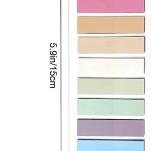 May include: A set of colorful sticky notes, measuring 2.2 inches wide and 5.9 inches long. The notes are arranged in a rectangular pad, with each note in a different pastel shade, including pink, peach, beige, green, purple, and blue.