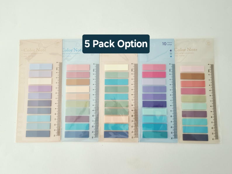 May include: A 5 pack of Color Note adhesive index tabs in various pastel and vibrant shades. Each pack features a vertical ruler printed on the side, with markings up to 14 cm, and contains 10 strips per colour, totalling 100 tabs per pack.