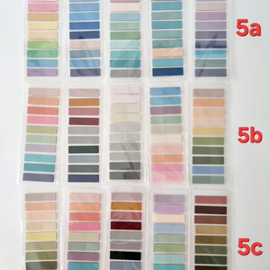 May include: A collection of colorful sticky note sets, each containing multiple rectangular notes in various pastel shades. The sets are arranged in rows and columns, with the text "5a", "5b", and "5c" visible on the right side.