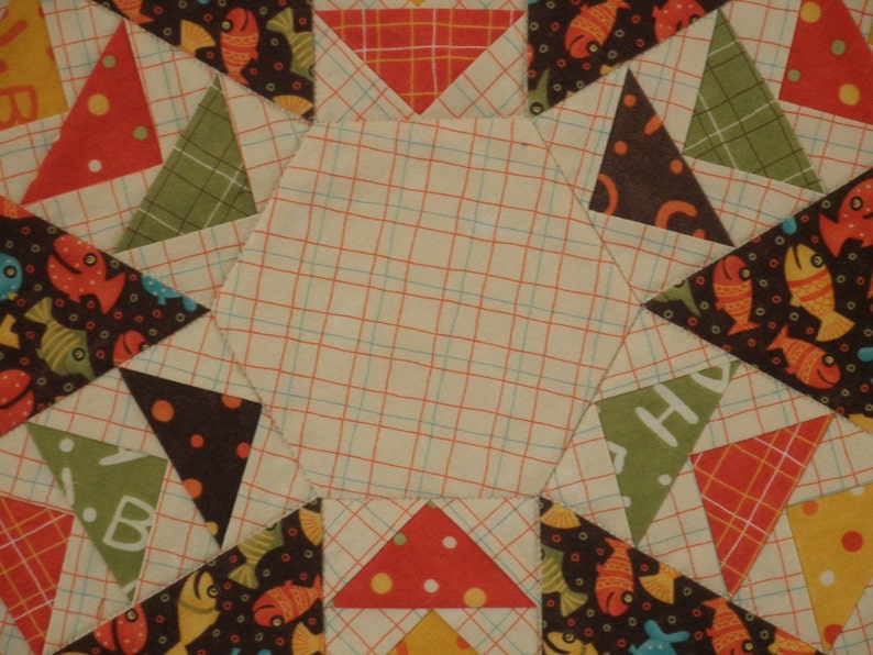 UNTT24 Quilted Flying Geese Table Topper Lollipop Fish