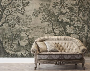 May include: A vintage-style wallpaper mural depicting a forest scene with trees, a river, and a small village in the distance. A light-colored sofa with a tufted back and a floral patterned fabric is placed in front of the wallpaper.