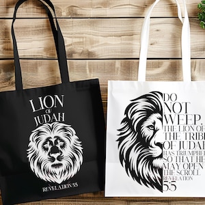 May include: Two tote bags, one black and one white, with lion graphics and text. The black bag reads "LION OF JUDAH" and "REVELATION 55". The white bag says "DO NOT WEEP" and "THE LION OF THE TRIBE OF JUDAH HAS TRIUMPHED, SO THAT HE MAY OPEN THE SCROLL REVELATION 5:5".