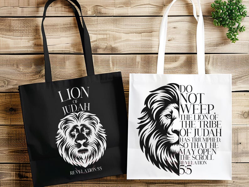 May include: Two tote bags, one black and one white, with lion graphics and text. The black bag reads "LION OF JUDAH" and "REVELATION 55". The white bag says "DO NOT WEEP" and "THE LION OF THE TRIBE OF JUDAH HAS TRIUMPHED, SO THAT HE MAY OPEN THE SCROLL REVELATION 5:5".