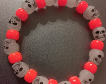 Glow in the Dark Skull and neon orange bead Bracelet - Samhain, Zombie, Skull, Halloween. Size medium