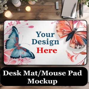 May include: A white desk mat or mouse pad mockup with a floral design featuring butterflies. The text "Your Design Here" is printed in the center of the mat.