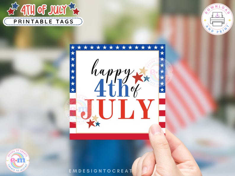 May include: A square printable tag with a patriotic theme. The design features the text "happy 4th of JULY" in red and blue, with star accents. The tag is held by a hand, with an American flag in the background.