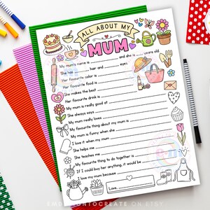 May include: A printable "All About My Mum" questionnaire with a green border, featuring fill-in-the-blank sections and illustrated doodles. Includes space for name, favourite things, and a message of love. Colourful pens and paper surround the sheet.