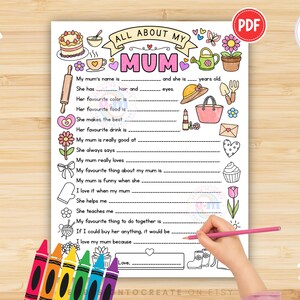 May include: A printable PDF worksheet titled "All About My Mum" with fill-in-the-blank prompts. The worksheet features hand-drawn illustrations of a cake, flowers, and other items. A hand is holding a pink pencil, filling out the worksheet.