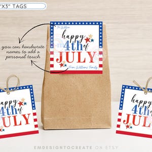 May include: Square gift tags with a patriotic theme. The tags are white with a red, white, and blue border and the words "happy 4th of July." The tags are 3 inches by 3 inches. The tags are attached to a brown paper bag.