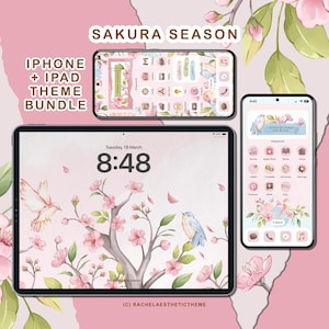 May include: A digital phone and tablet screen mockup with a pink and green floral theme. The screens display a pink and green floral background with a cherry blossom tree, birds, and the text "SAKURA SEASON". The phone screen also displays a clock with the time 9:40 and the text "Little by little, day by day". The tablet screen displays a clock with the time 8:48 and the text "Tuesday, 18 March".