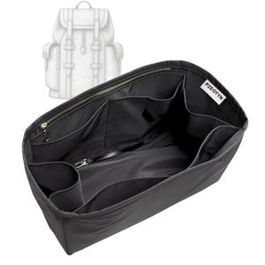 May include: Black nylon bag organizer with multiple compartments and a zipper closure. The organizer has a rectangular shape and is designed to fit inside a backpack. The brand name "PZEOTYN" is visible on a white tag.