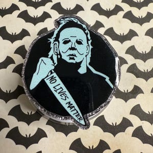 Horror themed magnetic phone grips