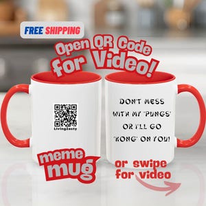 May include: White ceramic mug with a red interior and handle. The mug features the text "DON'T MESS WITH MY 'PUNGS' OR I'LL GO 'KONG' ON YOU!" and a QR code. The words "meme mug" are also visible.