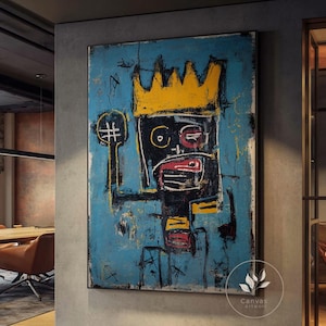 May include: A rectangular canvas wall art piece featuring a stylized black figure with a prominent yellow crown on a textured blue background. The figure has abstract facial features, a red mouth, and a raised arm, rendered in a bold, expressive style.