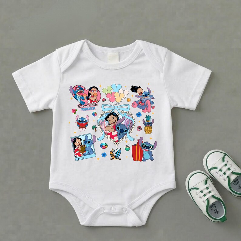 May include: A white short-sleeved baby bodysuit featuring a colorful graphic print of Lilo and Stitch characters, including balloons, a pineapple, a surfboard, and the text Best Friends Forever, accompanied by a pair of white sneakers with green trim.