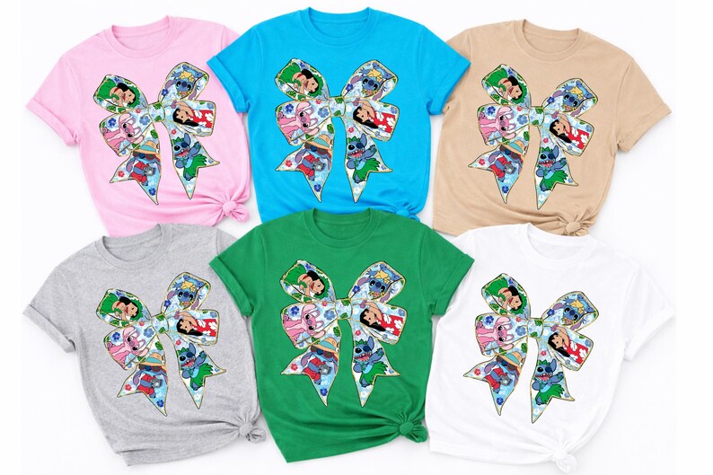 May include: Six short-sleeved t-shirts in various colours: pink, blue, tan, grey, green, and white. Each shirt features a large bow design with cartoon characters. The bow is decorated with a colourful pattern and character illustrations.