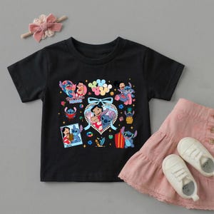 May include: A black short-sleeved t-shirt featuring a colorful graphic print of Lilo and Stitch characters, including hearts, surfboards, and the text Best Friends Forever, paired with a pink ruffled skirt and white sneakers.