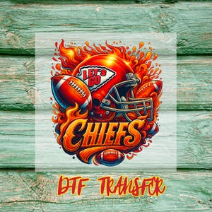 May include: A vibrant graphic featuring a red football helmet, two footballs, and the word "CHIEFS" in bold, orange lettering. The design includes flames and the text "LET'S GO". The words "DTF TRANSFER" are at the bottom.