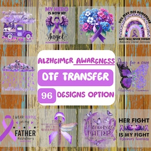 May include: A collection of DTF transfer designs with an Alzheimer's Awareness theme. The designs include purple ribbons, flowers, butterflies, and text such as "My Hero is Now My Angel" and "Memories Matter". The text "Alzheimer Awareness" and "96 Designs Option" are also present.