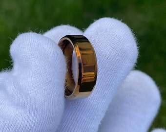 Ring size 8 1/4, Fire Treated/Colored Titanium, 7mm Width, Bevel Edge Polished