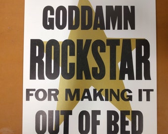 Eres un Rockstar Goddamn para hacerlo fuera de la cama--estirados a mano tipografía impresión