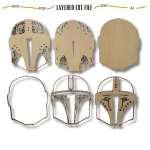 May include: Six layered wooden cutouts of a Mandalorian helmet, each with different levels of detail. The cutouts are arranged in two rows of three. The top row shows the helmet with increasing levels of detail, while the bottom row shows the helmet with decreasing levels of detail.