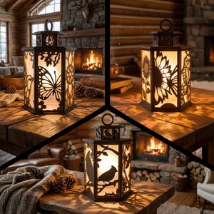 May include: Three decorative metal lanterns with intricate cut-out designs. One features a butterfly, another a sunflower, and the third a bird on a branch. Each lantern has a handle and is illuminated from within, creating a warm glow.