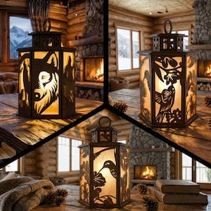 May include: Decorative metal lanterns with cut-out designs. One lantern features a wolf, another a bird, and the third a hummingbird. Each lantern has a handle and is illuminated from within, creating a warm glow. The lanterns are placed on a wooden table.