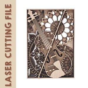 Puede incluir: Un diseño de madera cortado con láser que presenta un violín con intrincados patrones florales. El diseño es perfecto para la decoración del hogar o como un regalo único.